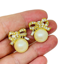 Load image into Gallery viewer, NINA RICCI signed vintage gold tone pearl rhinestone bow designer clip earrings