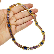 Load image into Gallery viewer, SWAROVSKI swan logo signed gold plated amethyst crystal designer necklace