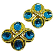 Load image into Gallery viewer, Vintage MONET gold tone blue glass designer clip on earrings