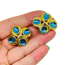 Load image into Gallery viewer, Vintage MONET gold tone blue glass designer clip on earrings