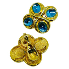 Load image into Gallery viewer, Vintage MONET gold tone blue glass designer clip on earrings