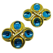 Load image into Gallery viewer, Vintage MONET gold tone blue glass designer clip on earrings