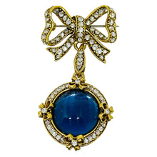 Load image into Gallery viewer, Vintage gold tone rhinestones bow dangle blue glass cab designer brooch