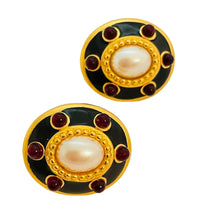 Load image into Gallery viewer, Vintage MONET gold enamel pearl red cabs designer runway clip on earrings