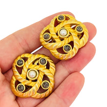 Load image into Gallery viewer, Vintage JJ signed matte gold faux pearl knot clip on earrings