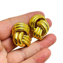 Load image into Gallery viewer, CINER signed vintage gold knot designer runway clip on earrings
