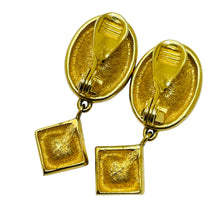 Load image into Gallery viewer, MONET signed vintage gold tone glass designer clip on drop earrings

