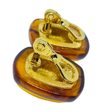 Load image into Gallery viewer, MONET signed vintage gold tone lucite amber designer 80's clip on earrings
