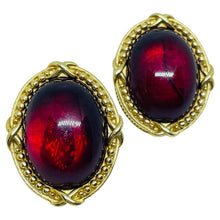 Load image into Gallery viewer, MONET signed vintage gold tone ruby red glass designer clip on earrings
