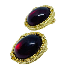 Load image into Gallery viewer, MONET signed vintage gold tone ruby red glass designer clip on earrings
