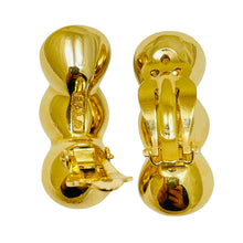 Load image into Gallery viewer, SWAROVSKI signed vintage gold plated amethyst crystals designer clip on earrings
