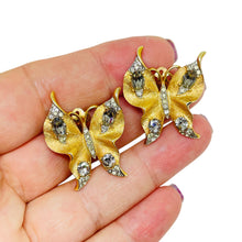 Load image into Gallery viewer, TRIFARI crown signed vintage gold rhinestone butterfly designer clip on earrings
