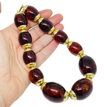 Load image into Gallery viewer, TRIFARI signed vintage gold tone faux amber designer beaded necklace
