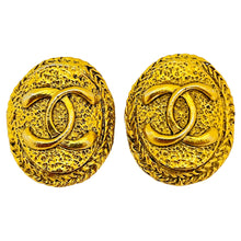 Load image into Gallery viewer, Vintage CHANEL gold CC logo designer runway clip on earrings
