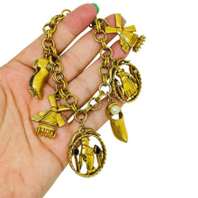 Load image into Gallery viewer, Vintage FLORENZA signed gold tone chain Dutch charms designer bracelet
