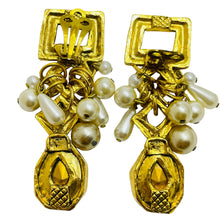 Load image into Gallery viewer, Vintage French gold plated pearl dangle designer runway clip on earrings
