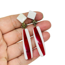Load image into Gallery viewer, Vintage JAPAN gold tone red white lucite dangle clip on earrings
