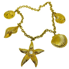Load image into Gallery viewer, Vintage KJL for AVON signed gold tone designer sea shells starfish necklace
