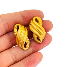 Load image into Gallery viewer, Vintage MONET matte gold designer clip on earrings
