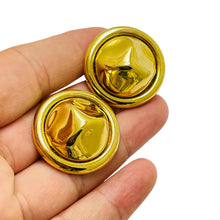 Load image into Gallery viewer, Vintage MONET signed gold tone designer clip on earrings
