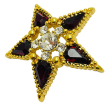 Load image into Gallery viewer, Vintage MONET signed gold tone red rhinestone designer star brooch
