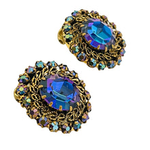 Load image into Gallery viewer, Vintage Made in AUSTRIA gold tone blue ab glass designer clip on earrings
