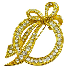 Load image into Gallery viewer, Vintage NOLAN MILLER signed gold tone rhinestone bow designer brooch
