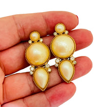 Load image into Gallery viewer, Vintage RICHELIEU gold rhinestone clip on 80’s earrings
