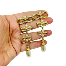 Load image into Gallery viewer, Vintage gold to e rhinestone pearl 80’s bow drop clip on earrings
