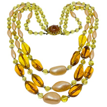 Load image into Gallery viewer, Vintage gold tone amber glass beaded multi strand 1960's designer necklace
