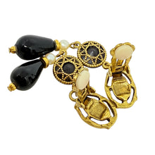 Load image into Gallery viewer, Vintage gold tone black glass pearl designer clip on earrings
