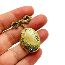 Load image into Gallery viewer, Vintage gold tone bow dangle locket designer brooch
