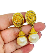 Load image into Gallery viewer, Vintage gold tone dangle faux pearl 80's designer clip on earrings
