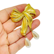 Load image into Gallery viewer, Vintage gold tone dangle faux pearls designer bow brooch
