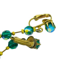 Load image into Gallery viewer, Vintage gold tone dangle green aurora crystals designer clip on earrings
