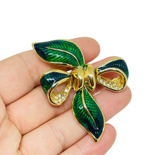 Load image into Gallery viewer, Vintage gold tone enamel rhinestone bow designer brooch
