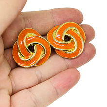 Load image into Gallery viewer, Vintage gold tone enamel twisted knot designer clip on earrings
