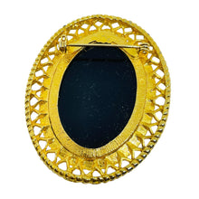 Load image into Gallery viewer, Vintage gold tone molded glass black cameo brooch
