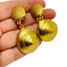Load image into Gallery viewer, Vintage gold tone seashell dangle designer clip on earrings
