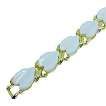 Load image into Gallery viewer, Vintage gold tone white thermoset leafs designer link bracelet
