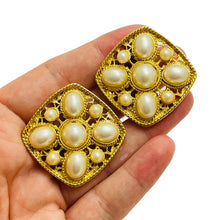 Load image into Gallery viewer, Vintage massive gold tone faux pearls designer runway clip on earrings
