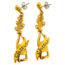 Load image into Gallery viewer, Vtg AVON gold rhinestone 'cheers' designer runway dangle earrings
