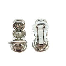 Load image into Gallery viewer, Vtg NOLAN MILLER silver glass clip on earrings designer runway
