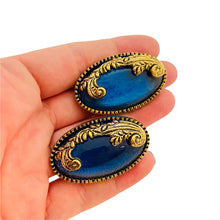 Load image into Gallery viewer, Vintage gold sapphire blue resin designer runway clip on earrings
