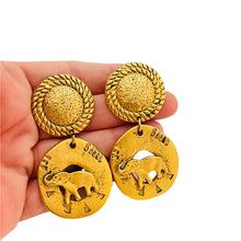 Load image into Gallery viewer, Vintage matte gold enamel dangle elephant designer runway earrings
