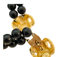 Load image into Gallery viewer, Vintage KJL for AVON gold black lucite rams head beaded designer runway necklace
