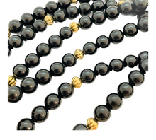 Load image into Gallery viewer, Vintage KJL for AVON gold black lucite rams head beaded designer runway necklace
