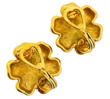 Load image into Gallery viewer, Vintage MONET gold flower designer runway clip on earrings
