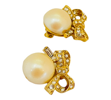 Load image into Gallery viewer, Vintage NINA RICCI gold rhinestone pearl bow designer runway clip on earrings
